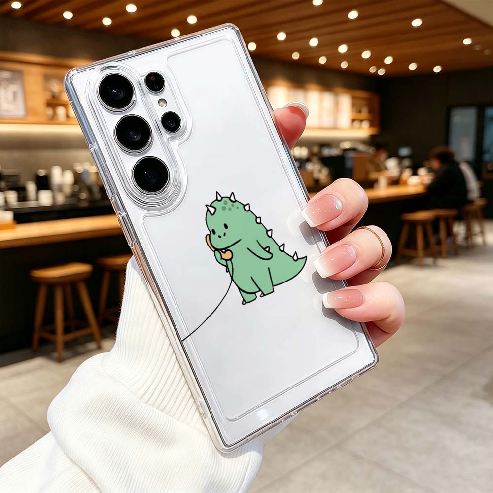 カートゥーン風の緑の恐竜カップルデザインのSamsung G - Samsung Galaxy S24 のレビューと価格